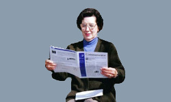 Woman reading newsletter