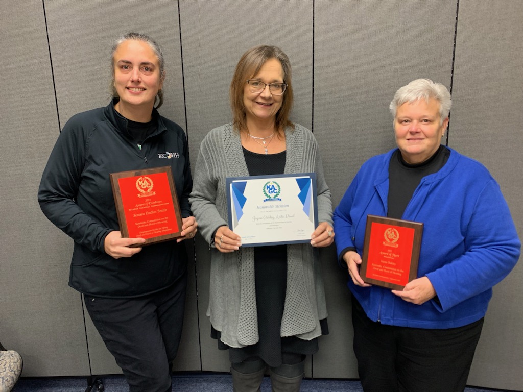 Image of Jessica, Anita, and Jayna with awards